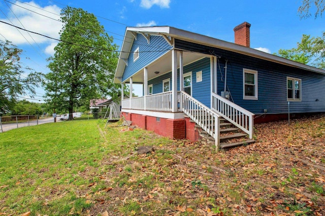 1050 W Blackstock, Spartanburg, SC 29301 - view of front facade with a chimney and covered porch