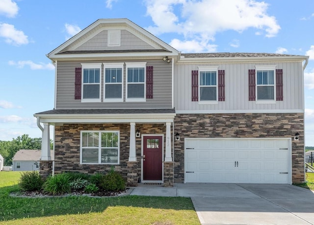912 Brynderwen, Lyman, SC 29365 - craftsman house featuring stone siding, a front yard, a garage, and concrete driveway