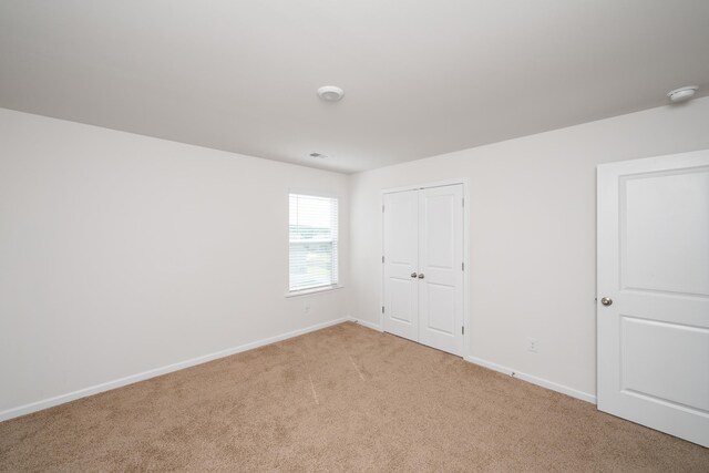 912 Brynderwen, Lyman, SC 29365 - unfurnished bedroom featuring carpet flooring, baseboards, and a closet