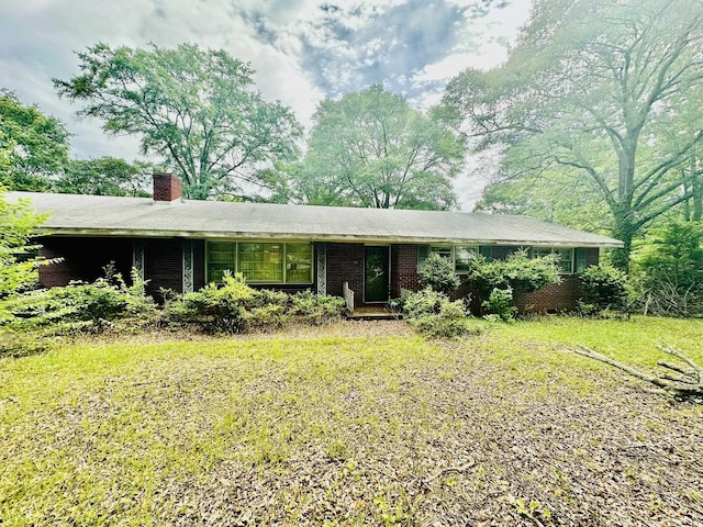 139 Whittier Pl, Spartanburg, SC 29303 - single story home featuring a chimney and brick siding