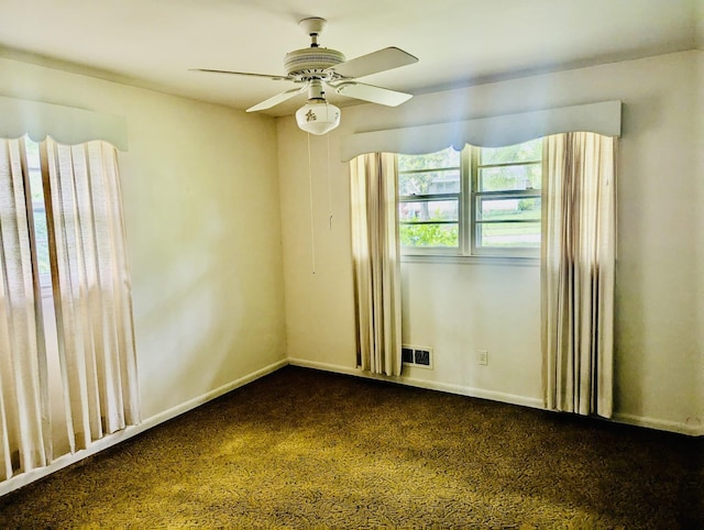 139 Whittier Pl, Spartanburg, SC 29303 - spare room with a ceiling fan, dark carpet, and baseboards