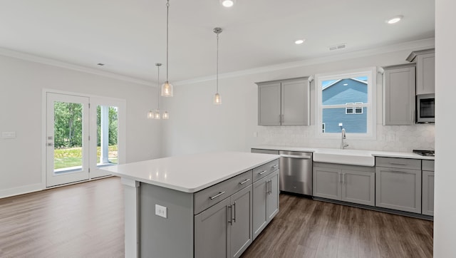 315 Fiery, Mauldin, SC 29607 - kitchen with gray cabinetry, a sink, appliances with stainless steel finishes, dark wood-style floors, and crown molding