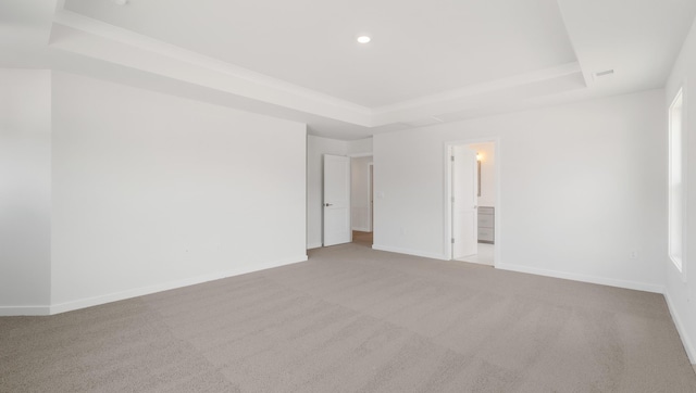 315 Fiery, Mauldin, SC 29607 - unfurnished room with a tray ceiling, carpet, baseboards, and recessed lighting