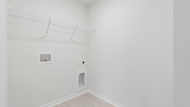 315 Fiery, Mauldin, SC 29607 - washroom with hookup for an electric dryer, baseboards, hookup for a washing machine, and light wood-style floors
