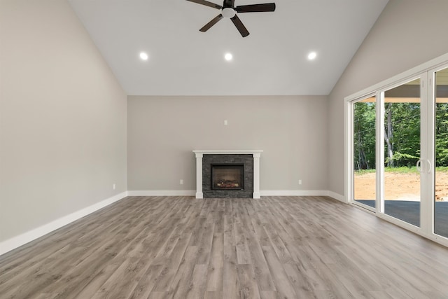 3135 E Croft, Spartanburg, SC 29302 - unfurnished living room with lofted ceiling, a ceiling fan, a fireplace, light wood-style floors, and baseboards
