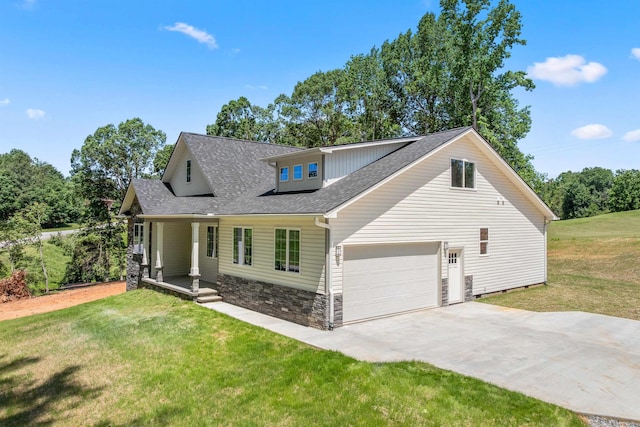 3135 E Croft, Spartanburg, SC 29302 - view of front of house with a porch, a front yard, a shingled roof, concrete driveway, and stone siding
