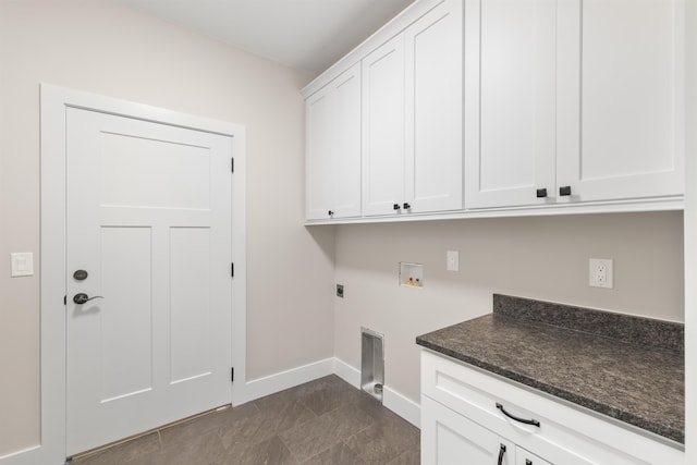 3135 E Croft, Spartanburg, SC 29302 - washroom featuring cabinet space, baseboards, washer hookup, and hookup for an electric dryer