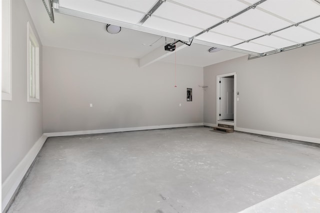 3135 E Croft, Spartanburg, SC 29302 - garage featuring a garage door opener and baseboards