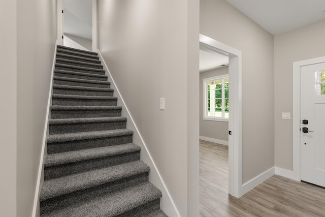 3135 E Croft, Spartanburg, SC 29302 - stairs featuring plenty of natural light, wood finished floors, and baseboards