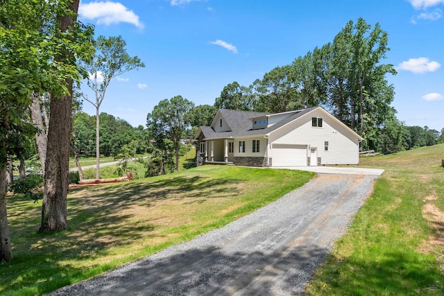 3135 E Croft, Spartanburg, SC 29302 - view of front of home featuring dirt driveway, a front lawn, stone siding, and an attached garage