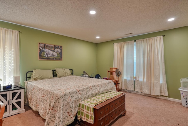 955 Baggett Rd, Enoree, SC 29335 - bedroom with recessed lighting, light carpet, and a textured ceiling