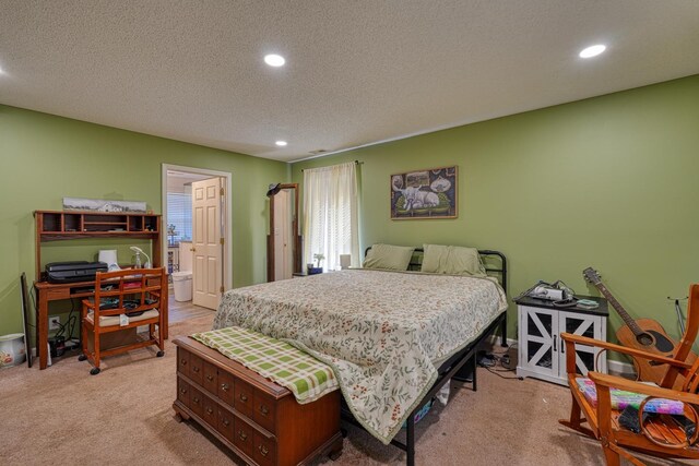 955 Baggett Rd, Enoree, SC 29335 - bedroom with recessed lighting, light carpet, a textured ceiling, and ensuite bath
