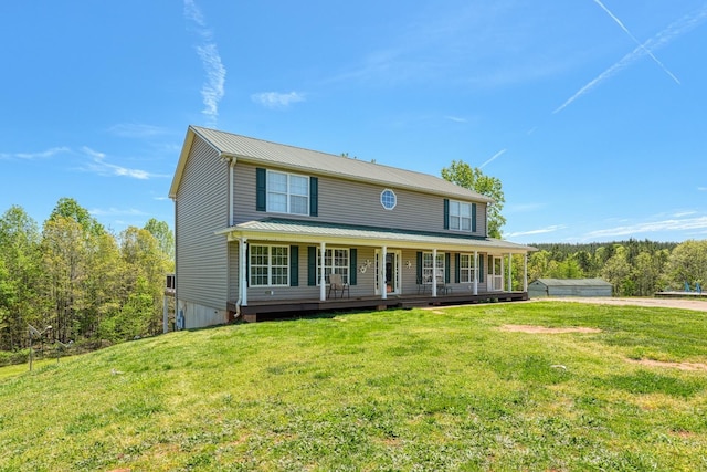 955 Baggett Rd, Enoree, SC 29335 - view of front of property featuring covered porch, a front yard, and metal roof