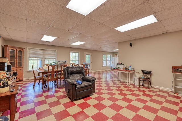 955 Baggett Rd, Enoree, SC 29335 - living area featuring a drop ceiling, light flooring, and baseboards