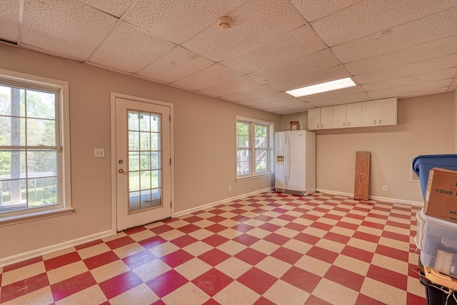 955 Baggett Rd, Enoree, SC 29335 - entryway featuring a paneled ceiling, light floors, and baseboards