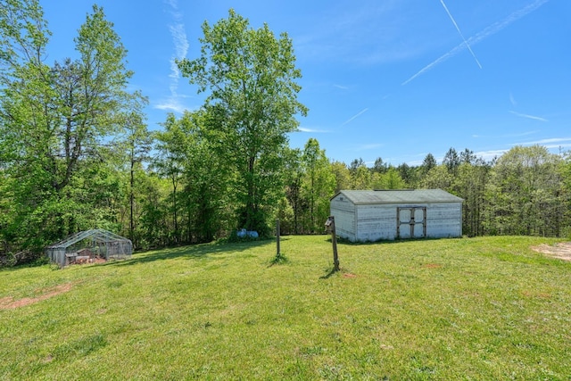 955 Baggett Rd, Enoree, SC 29335 - view of green lawn with a forest view