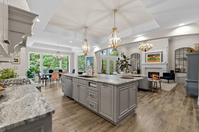 127 Turnberry, Spartanburg, SC 29306 - kitchen featuring gray cabinets, a sink, a chandelier, a raised ceiling, and stainless steel dishwasher
