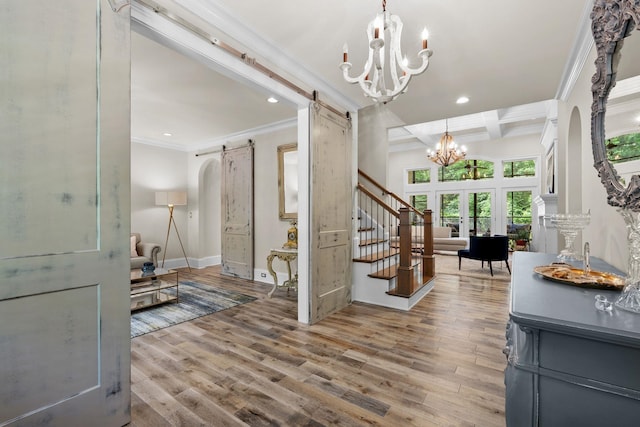 127 Turnberry, Spartanburg, SC 29306 - foyer entrance with a barn door, a chandelier, ornamental molding, recessed lighting, and wood finished floors