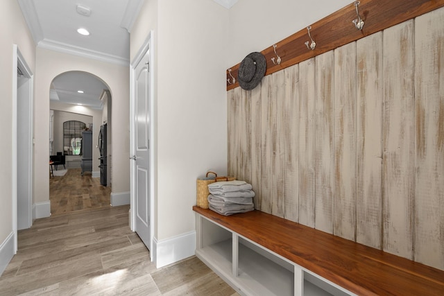 127 Turnberry, Spartanburg, SC 29306 - mudroom with crown molding, light wood finished floors, arched walkways, recessed lighting, and baseboards