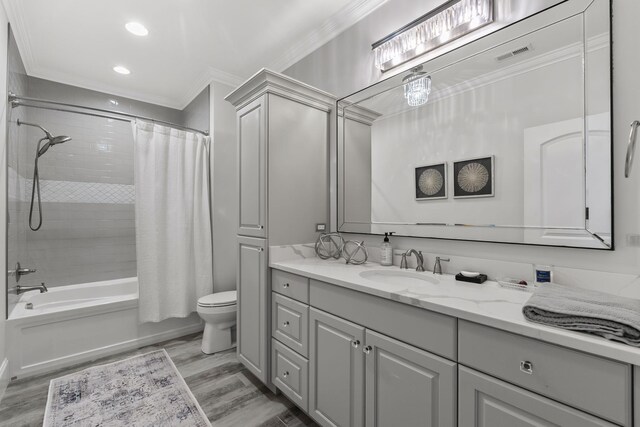 127 Turnberry, Spartanburg, SC 29306 - full bath with toilet, vanity, wood finished floors, crown molding, and shower / bath combination with curtain
