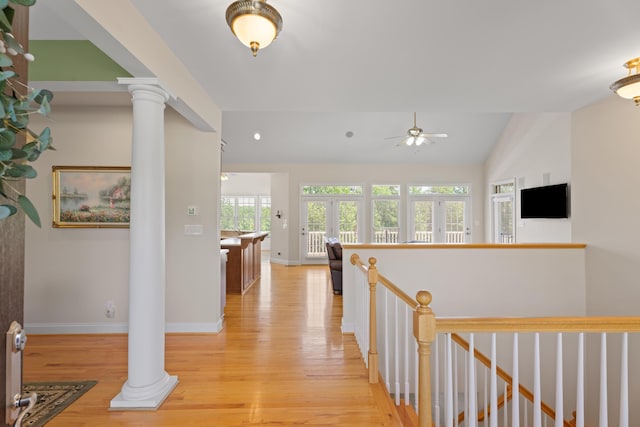 404 N Tidewater, Inman, SC 29349 - hallway featuring decorative columns, light wood-style floors, an upstairs landing, baseboards, and lofted ceiling
