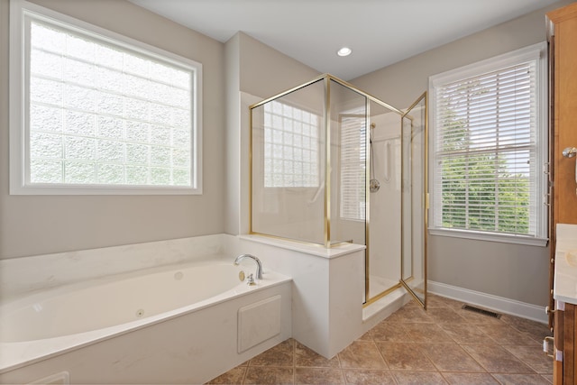 404 N Tidewater, Inman, SC 29349 - full bathroom with a garden tub, a stall shower, vanity, and tile patterned floors