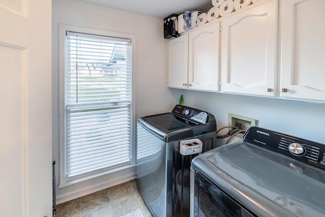 204 Thornhill, Spartanburg, SC 29301 - washroom featuring cabinet space, separate washer and dryer, and baseboards