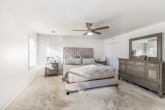 204 Thornhill, Spartanburg, SC 29301 - carpeted bedroom featuring multiple windows, a closet, baseboards, and a ceiling fan