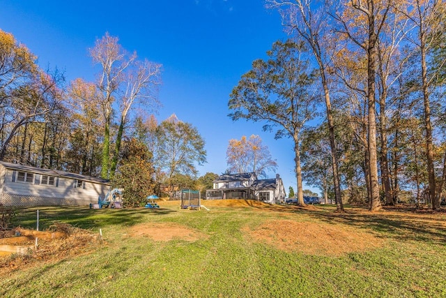 204 Thornhill, Spartanburg, SC 29301 - view of green lawn featuring a playground
