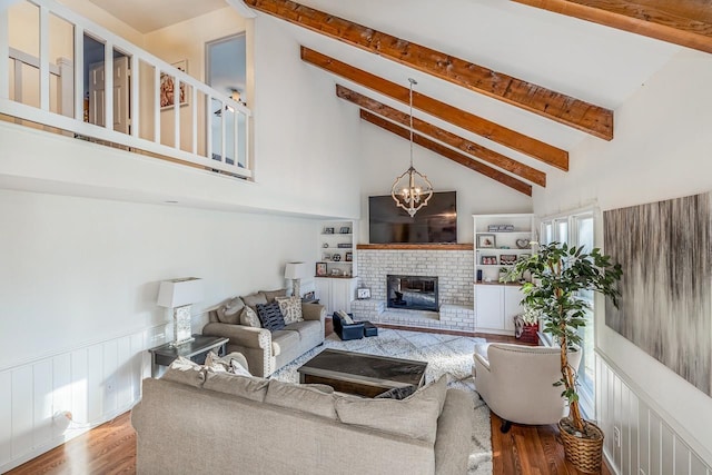 204 Thornhill, Spartanburg, SC 29301 - living room featuring wood finished floors, beamed ceiling, high vaulted ceiling, a chandelier, and a fireplace