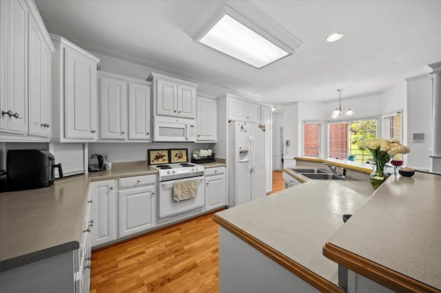 123 S Lake Emory, Inman, SC 29349 - kitchen featuring white appliances, a sink, a chandelier, light wood-style flooring, and recessed lighting