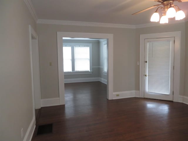 525 Glendalyn, Spartanburg, SC 29302 - spare room with dark wood-style floors, ornamental molding, a ceiling fan, and baseboards