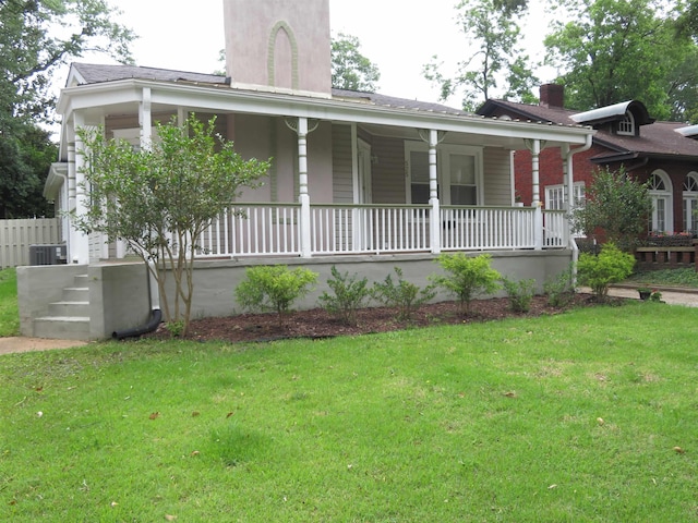 525 Glendalyn, Spartanburg, SC 29302 - view of front facade featuring covered porch, a chimney, central air condition unit, and a front yard
