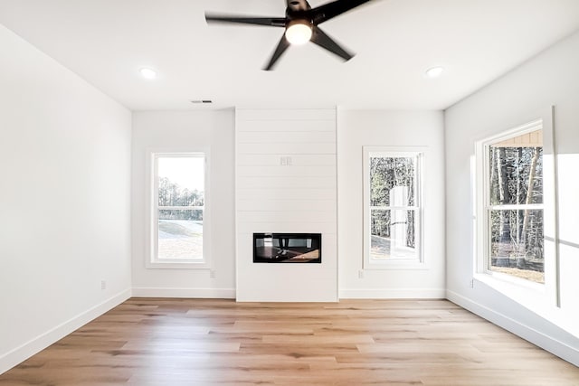 1623 Fairfield, Chesnee, SC 29323 - unfurnished living room featuring light wood-type flooring, baseboards, a fireplace, and recessed lighting