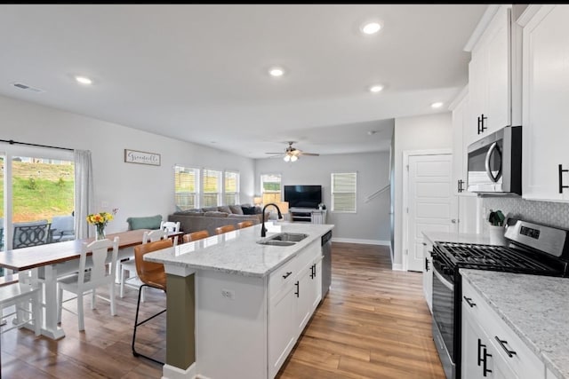1019 Appalachian, Moore, SC 29369 - kitchen featuring stainless steel appliances, a sink, ceiling fan, an island with sink, and recessed lighting