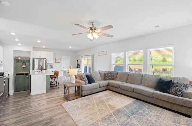 1019 Appalachian, Moore, SC 29369 - living room featuring light wood-style flooring, a ceiling fan, and recessed lighting
