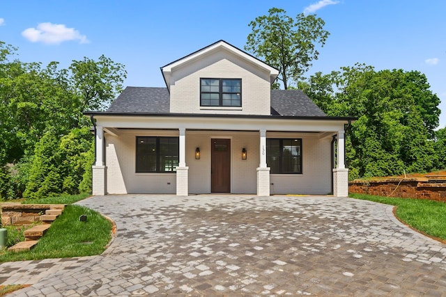 130 Market Bay, Simpsonville, SC 29681 - view of front of home with brick siding, covered porch, and a shingled roof
