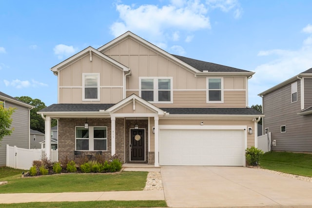 813 Elgon Walk, Fountain Inn, SC 29644 - view of front of house featuring board and batten siding, driveway, an attached garage, and a porch