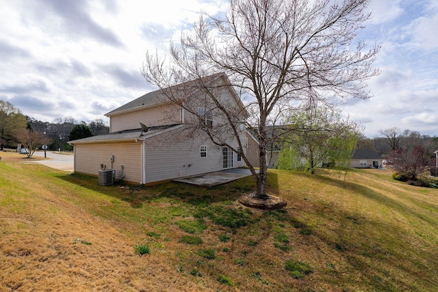100 Maximus, Greer, SC 29651 - view of side of home featuring a patio area, a lawn, and central AC