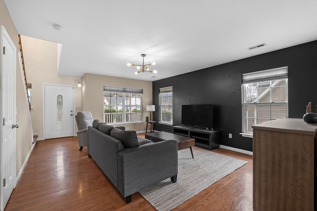 100 Maximus, Greer, SC 29651 - living area with wood finished floors, a chandelier, and baseboards
