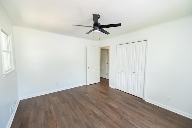 1635 Riveroak Rd, Inman, SC 29349 - unfurnished bedroom with dark wood-style floors, baseboards, ornamental molding, a closet, and ceiling fan