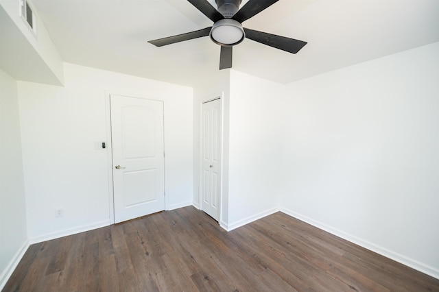 1635 Riveroak Rd, Inman, SC 29349 - spare room featuring dark wood-style floors, ceiling fan, and baseboards