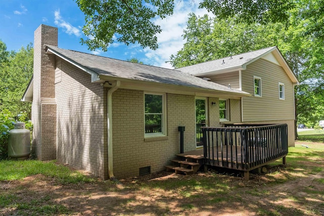 1635 Riveroak Rd, Inman, SC 29349 - rear view of house with a chimney, brick siding, a deck, and roof with shingles