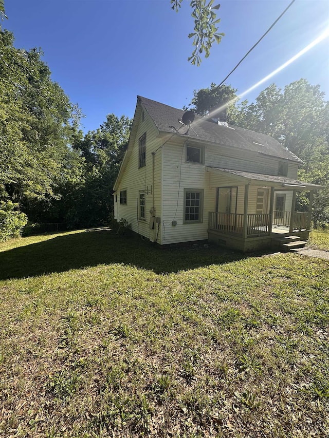 131 Furman St, Enoree, SC 29388 - view of side of home featuring a lawn and a deck