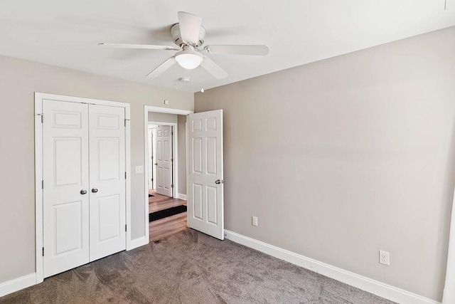 137 Whitesprings, Spartanburg, SC 29302 - unfurnished bedroom with carpet, baseboards, a closet, and a ceiling fan