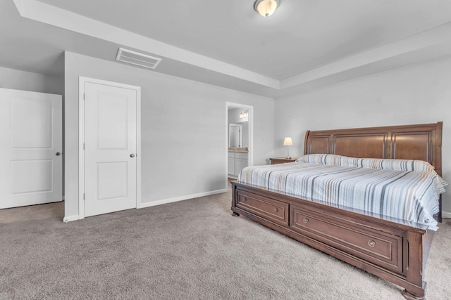 7096 Luna Mae, Boiling Springs, SC 29316 - carpeted bedroom featuring baseboards, a tray ceiling, and connected bathroom