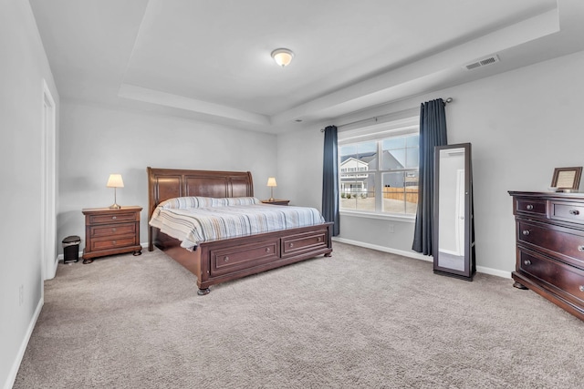 7096 Luna Mae, Boiling Springs, SC 29316 - bedroom featuring a tray ceiling, carpet flooring, and baseboards