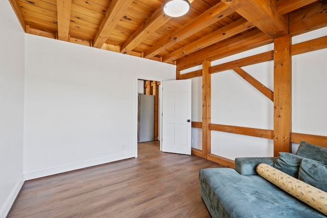 868 Old Hundred, Pelzer, SC 29669 - living area featuring wood finished floors, baseboards, and wood ceiling with exposed beams