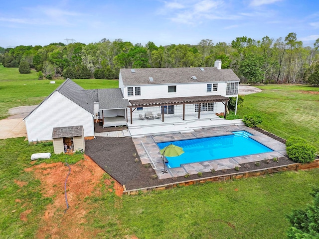 868 Old Hundred, Pelzer, SC 29669 - swimming pool featuring a pergola, a lawn, a deck, and a patio area