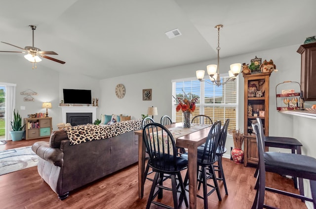 651 Willow Bank, Moore, SC 29369 - dining space featuring lofted ceiling, a chandelier, healthy amount of natural light, ceiling fan, and wood finished floors